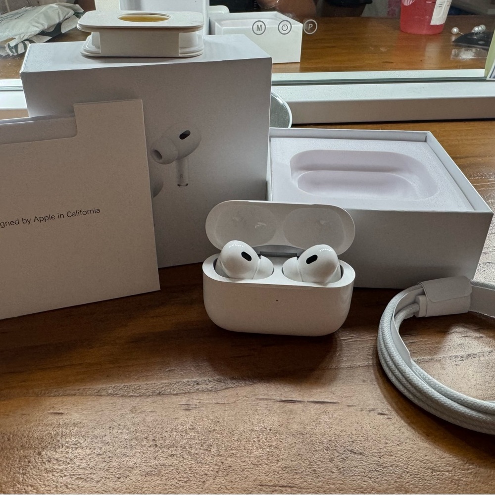 Apple AirPods Pro with White Charging Case and Cable